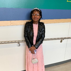 Female student is all dressed up for dance.