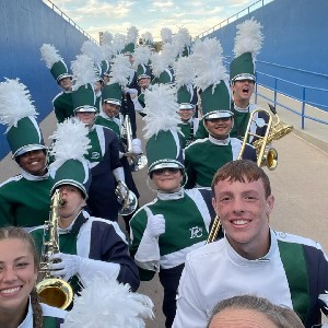 Pine Creek High School band students smile for a group selfie