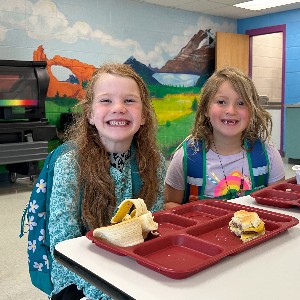 Students enjoy breakfast together