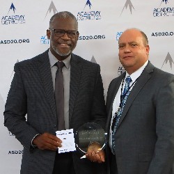 MSgt. Anthony Rush poses with Superintendent Tom Gregory at the 2022 Hall of Excellence