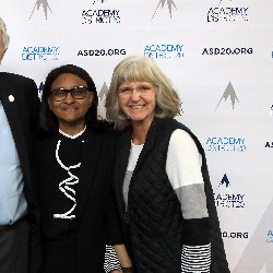 Dr. Mary Thurman poses for a picture with old friends