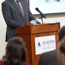 MSgt. Anthony Rush delivers speech at the 2022 Hall of Excellence