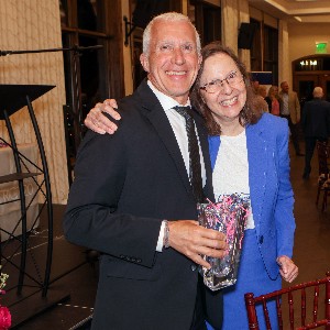Jon Wuerth and Karla Powers smile for a picture at the 2023 Retiree Banquet