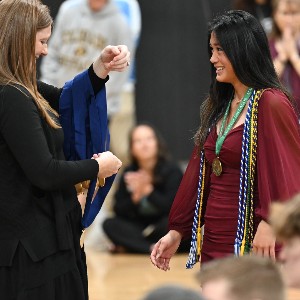 Student preparing to receive medal