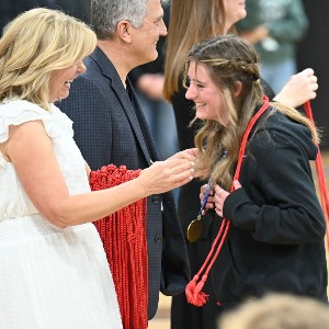 Student laughing at awards ceremony