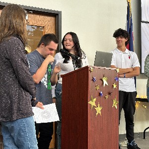 A D20 staff member is honored for her service to students