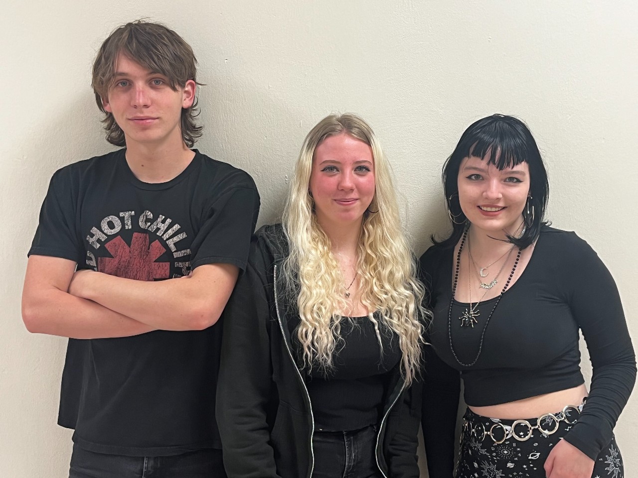 Students standing by wall