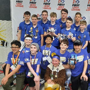 Microbots robotics team pose for a picture at the World’s First Lego Competition in Houston, Texas