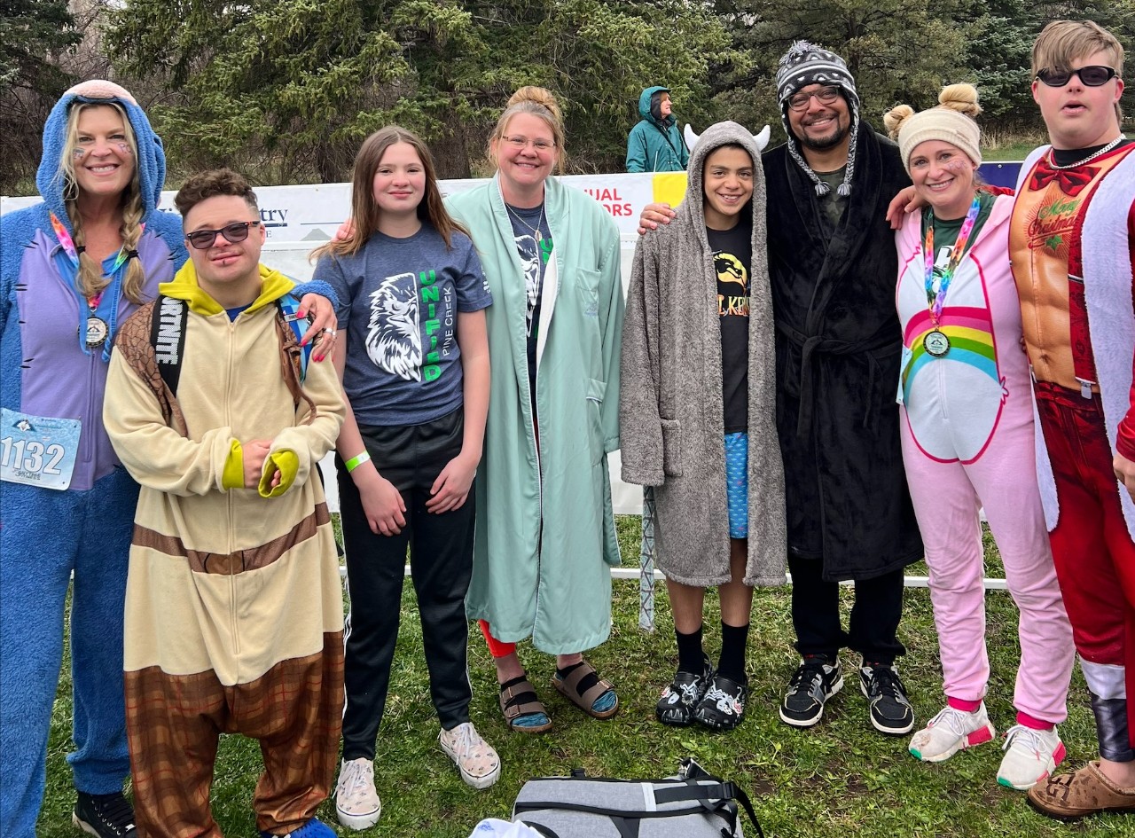 Polar plunge participants pose for the camera