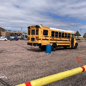 A bus in a parking lot