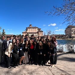 DCC Seniors in DECA pose by the Broadmoor Lake