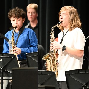 Two students playing alto saxophone 