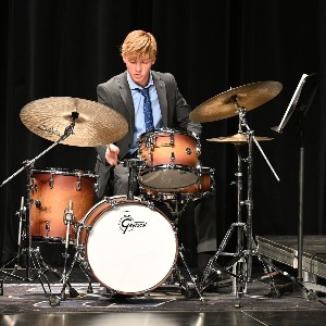 Drummer playing in concert