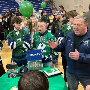 Students in ice hockey jerseys