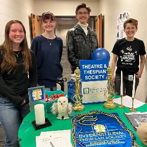 Students at a table representing Pine Creek Theatre and Thespian Society