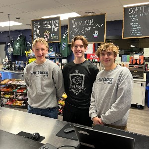 Students selling snacks in the cafeteria