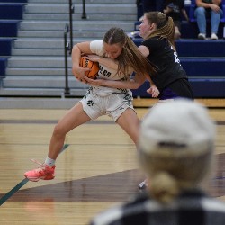 Player trying to hold on to the ball