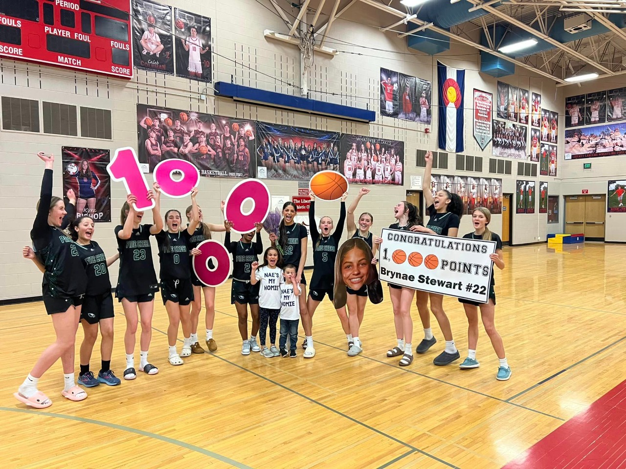 Team celebrates Brynae Stewart's 1,000th career point!