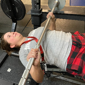 Student, Madison, lifting weights