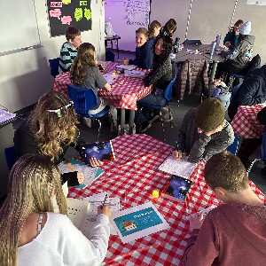 Students looking at their menus for books