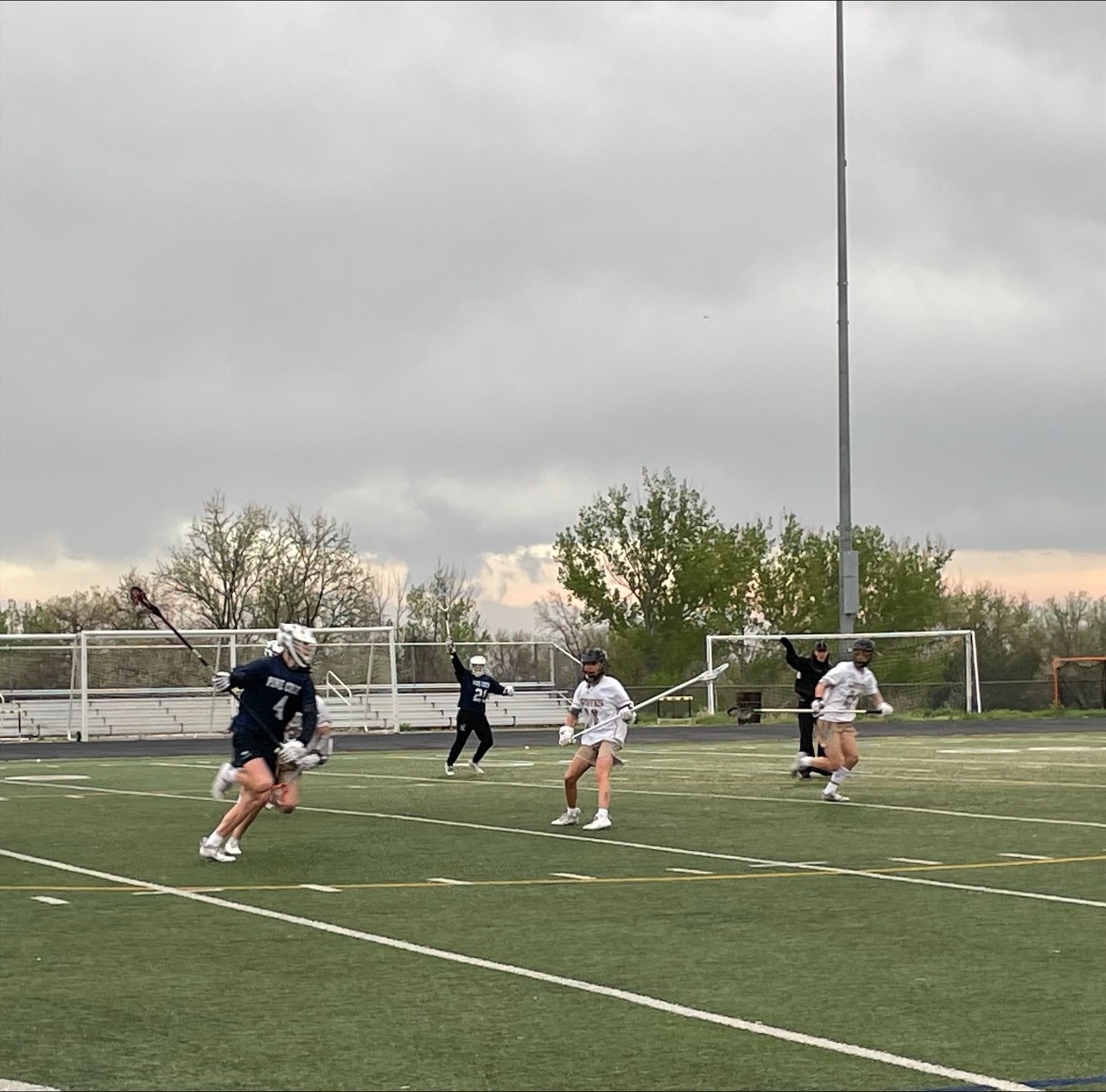 Boys playing lacrosse