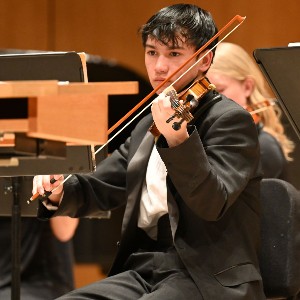 Student playing violin