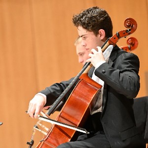 Student playing cello