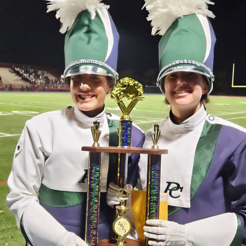 Band students pose with trophy