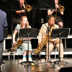 Girls playing saxophones