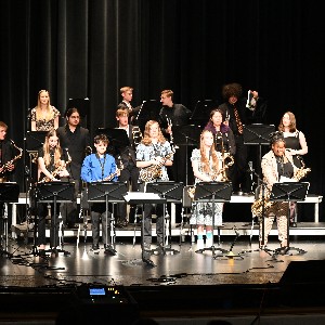 Students standing at the end of the concert