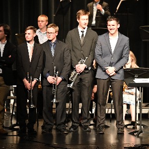 Students standing on stage