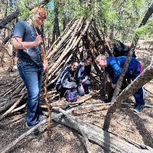 Students found a teepee out of trees