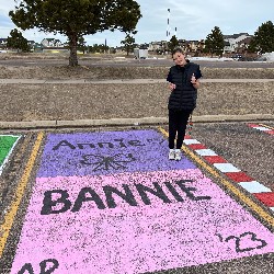 Parking spot painted purple and pink