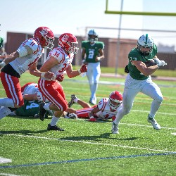 #13 runs with the ball to avoid opponent