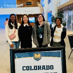 Directional sign with an arrow that says, Colorado Knowledge Bowl Multipurpose Room