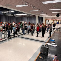 Students practicing for the parade of lights 