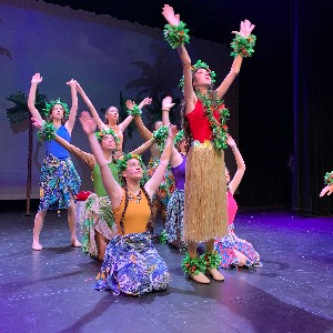 Tiger Lily dancing with her group of ladies.