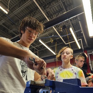 Students are learning to tap threads and power tool safety in Automotive 1 class.