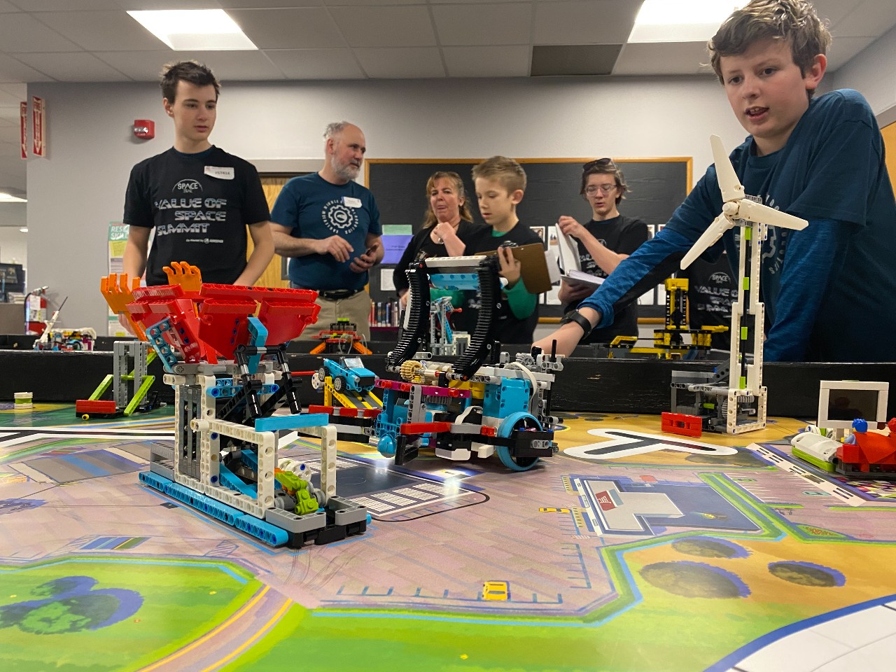 The EMS robotics team works on lego robots.