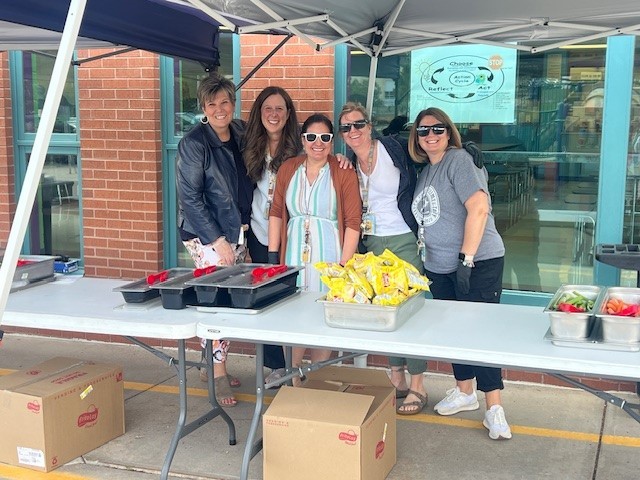 Staff serve lunch