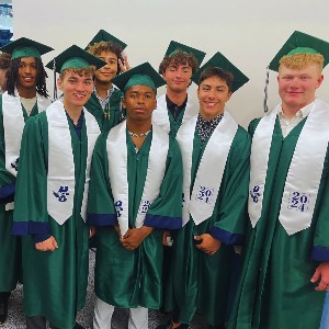 Group of boys in graduation robes