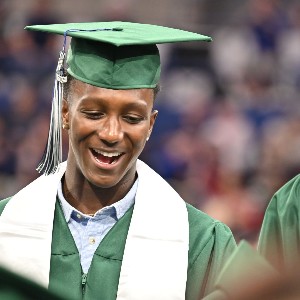 Graduate laughing