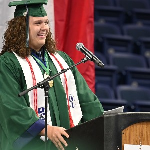 Student speaking, talking at the microphone