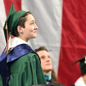 Student smiling in Graduation robe