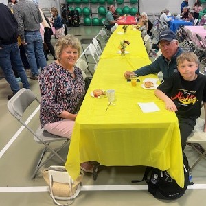 Students enjoy breakfast with their special friends. 