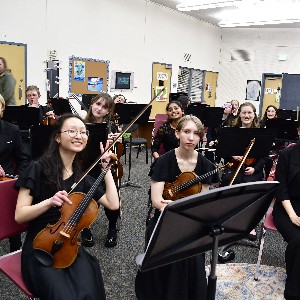 Violin students of the string orchestra.
