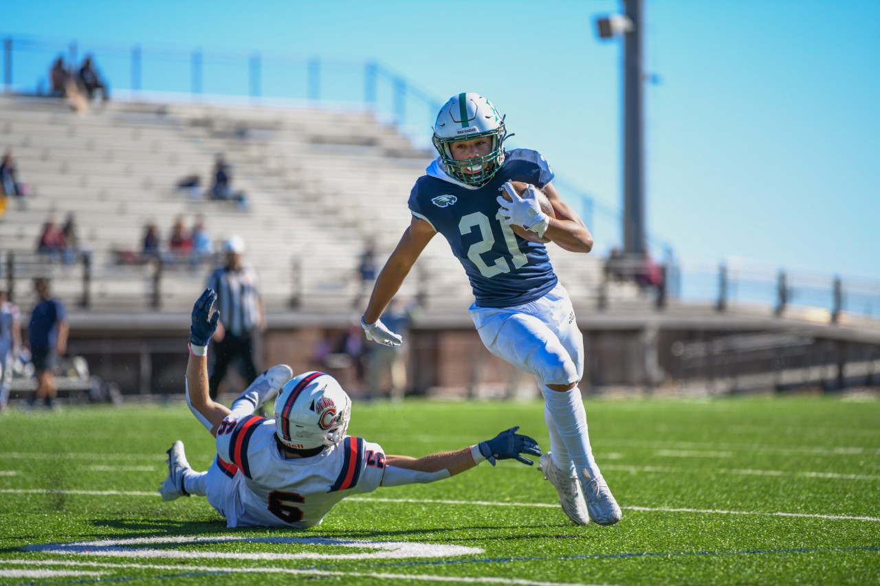 #20 running the ball down the field