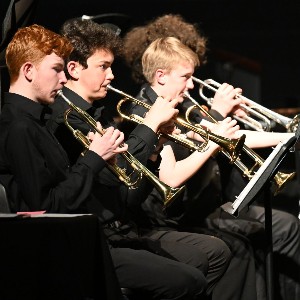 Four trumpet players