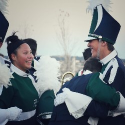 Band members hug after a great performance