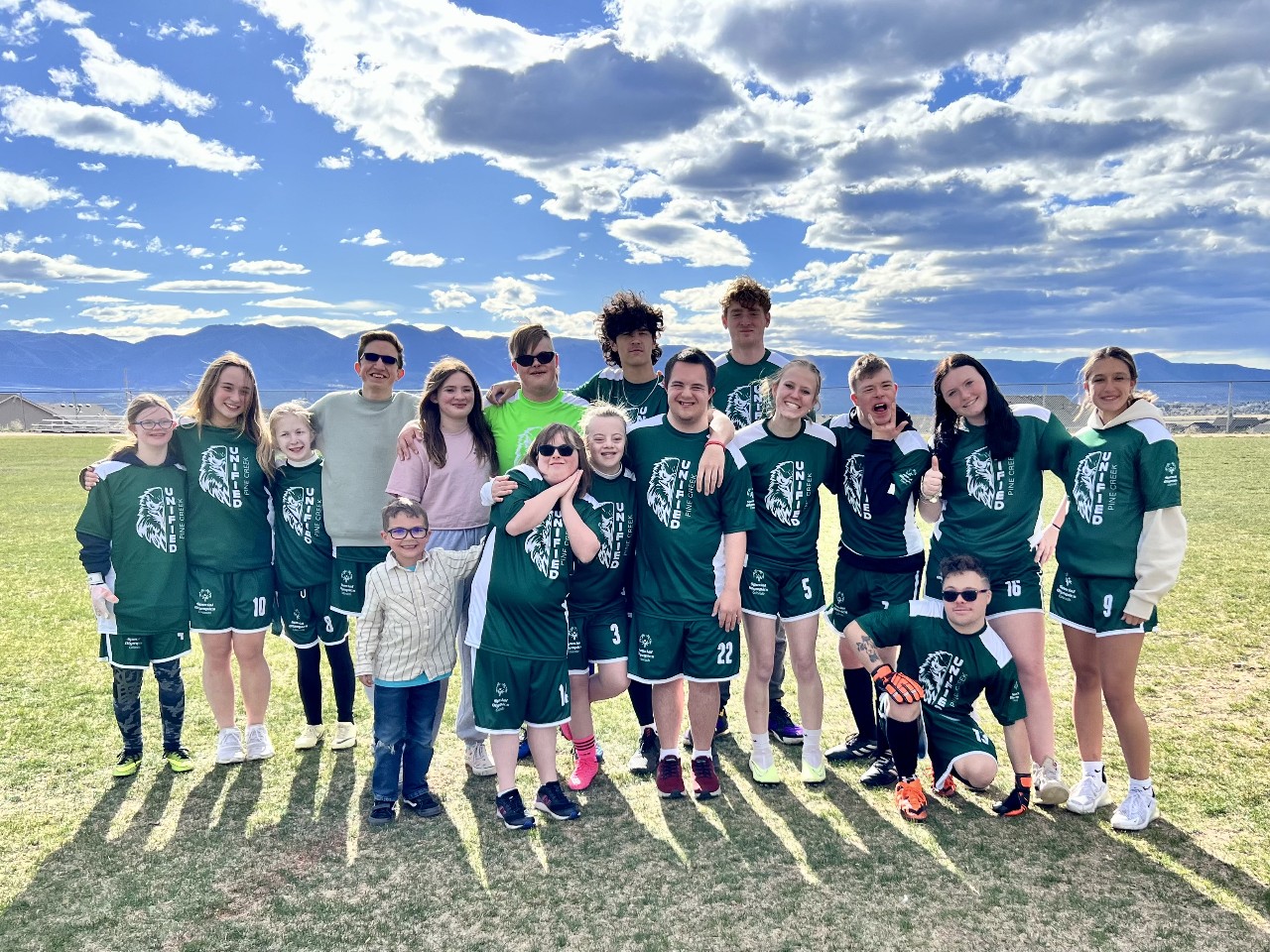 A group team photo of the Unified Soccer team